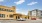Apartment building exterior with cars parked