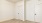 Bedroom with carpet and closet door