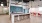 Clubhouse with kitchen that has blue backsplash